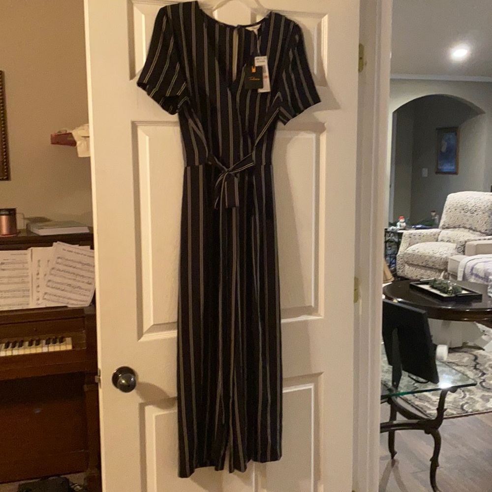 Takara Women’s Black jumpsuit with white stripes. NWT, Size 13